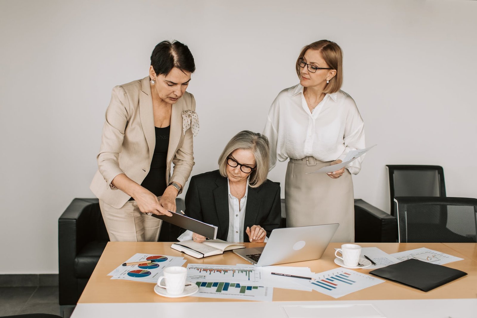 mature person showing the papers to the woman